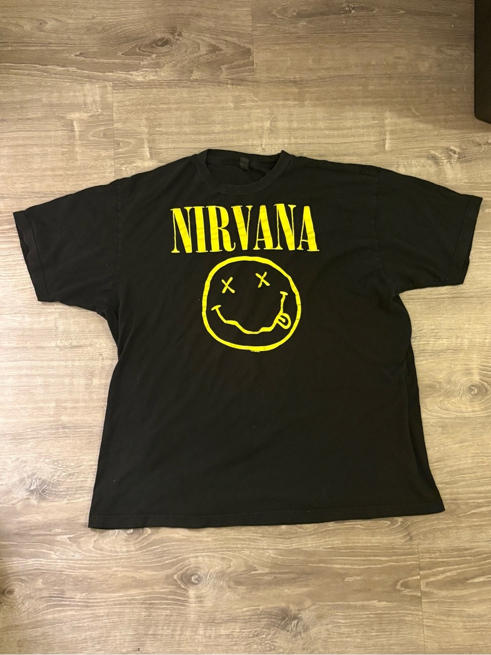 NIRVANA Black Tee with Yellow Smiley Logo